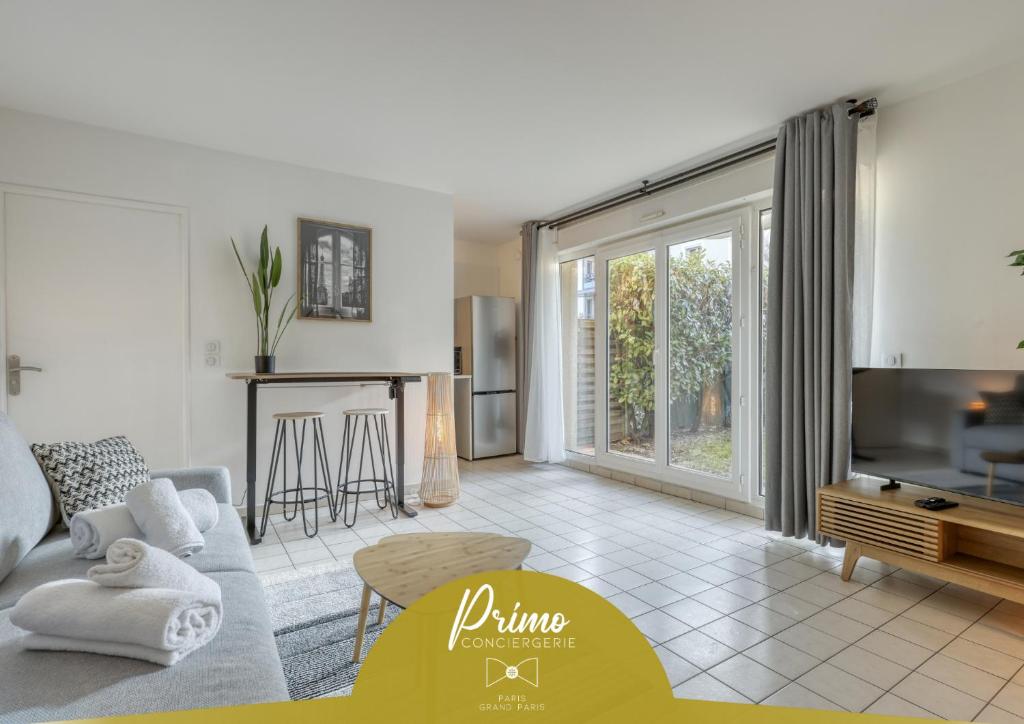 Ảnh trong thư viện ảnh của Studio Moderne avec jardin et garage ở Nanterre