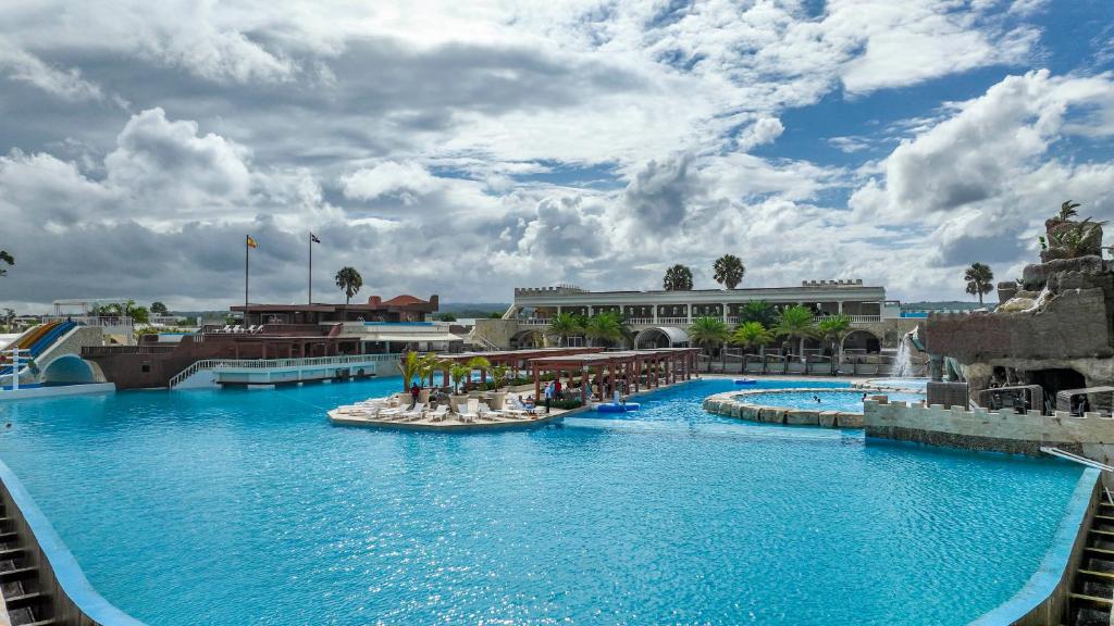 a view of a pool at a resort at Sosua Ocean Village, Villa 9 Campo Del Mar , IV in Sosúa