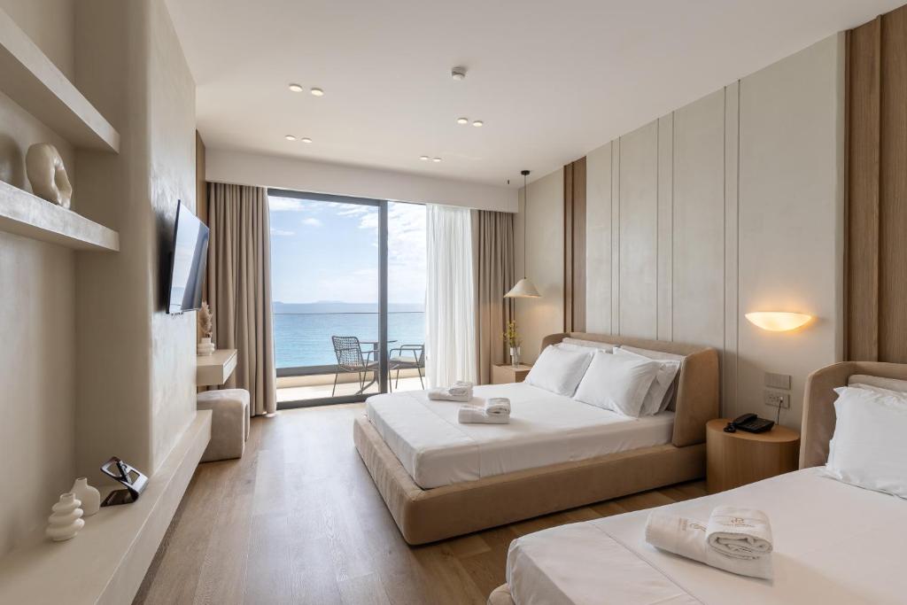 En eller flere senge i et værelse på Ciao Borshi Boutique Hotel