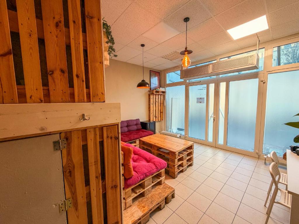 Postel nebo postele na pokoji v ubytování Urban Capsule