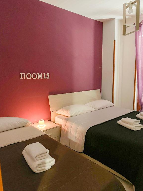 Giường trong phòng chung tại La Piazzetta