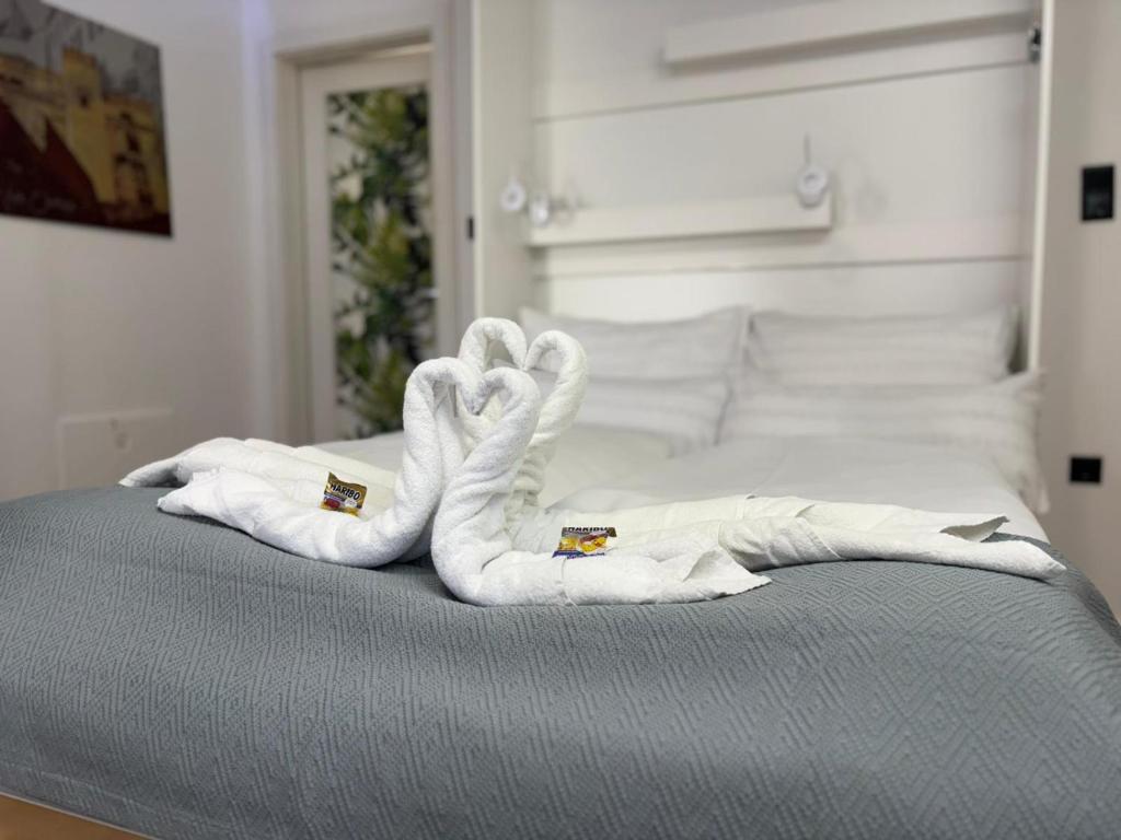 Postel nebo postele na pokoji v ubytování Danube Rooms Abteistrasse