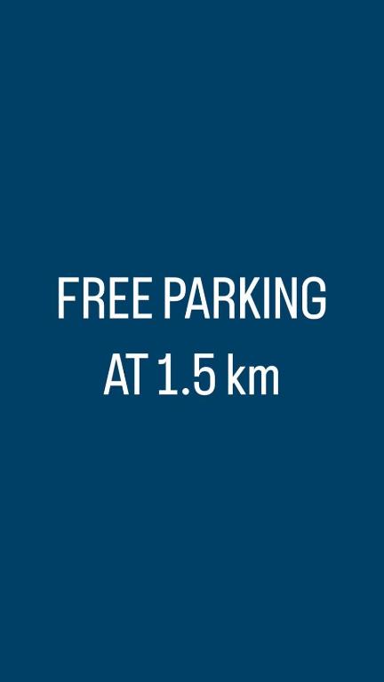 a blue background with the text free parking at km at Acquarium dream apartment kate in Genoa