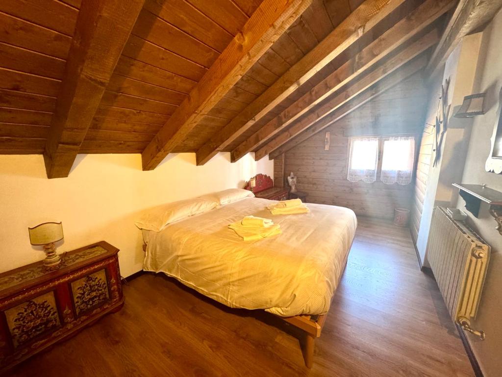 Giường trong phòng chung tại Ca Novella Apartment