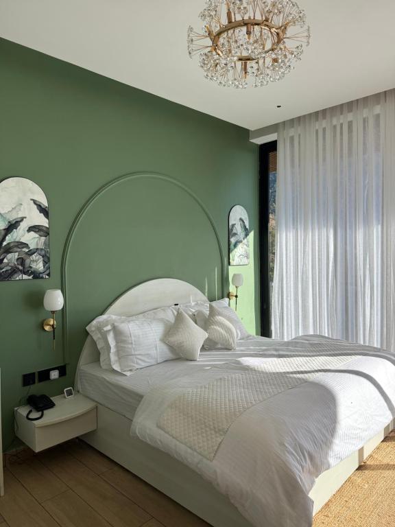 Giường trong phòng chung tại Avatara