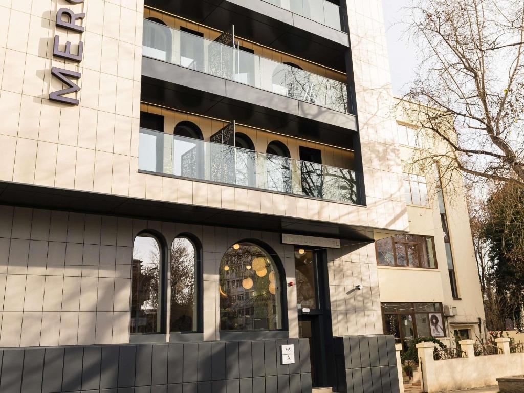 an external view of a building at Mercure Bucharest Cantemir in Bucharest