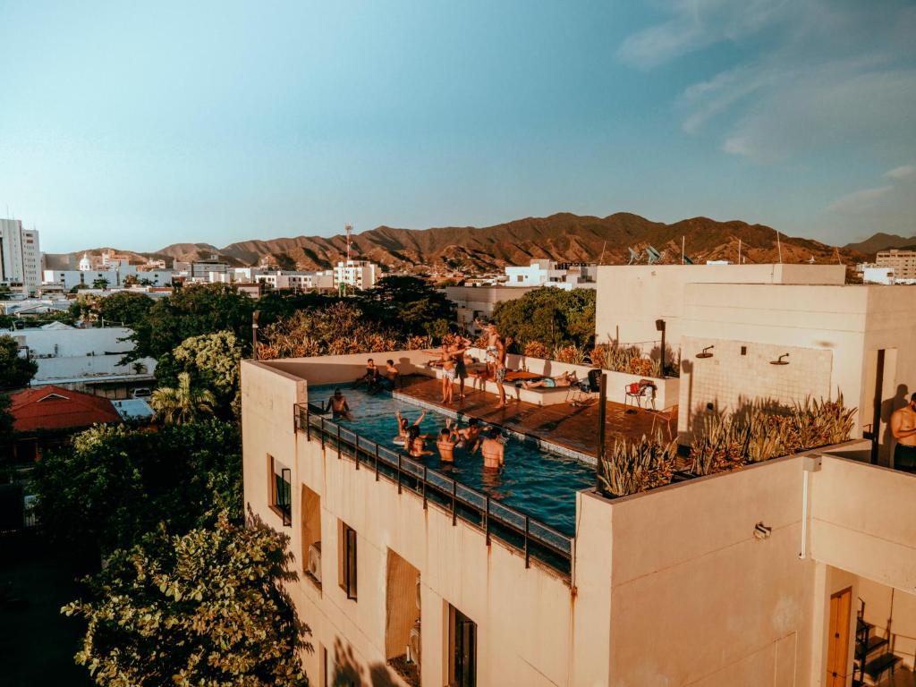 a view of a pool from a building at Viajero Santa Marta Hostel in Santa Marta