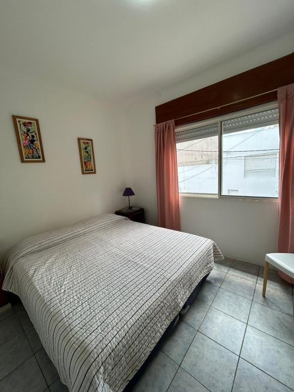 En eller flere senge i et værelse på El Nido FM