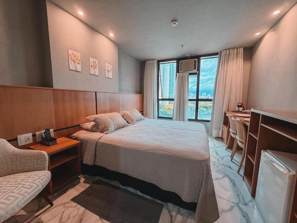 En eller flere senge i et værelse på Flat Comfort Taguatinga - Cama King - Sauna, academia e Piscina - Propriedade Particular 508