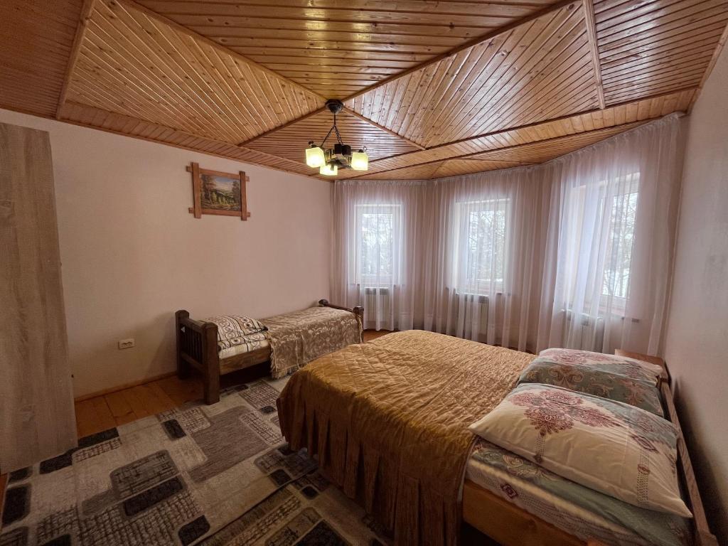 En eller flere senge i et værelse på Vodograi