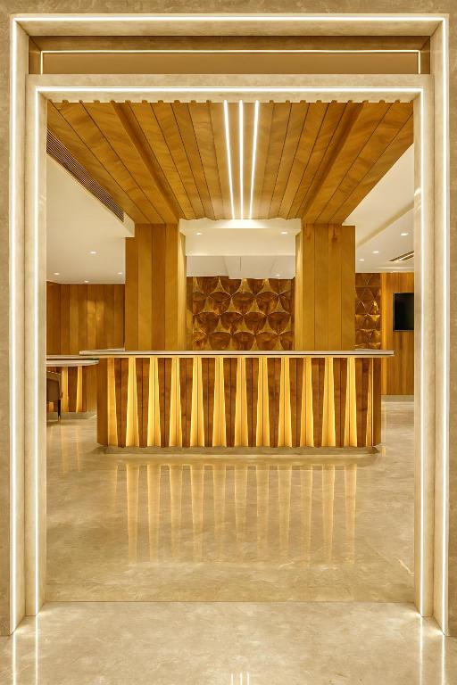a large lobby with a staircase and wooden walls at The Vanson Pride, Delhi Central Stay in New Delhi