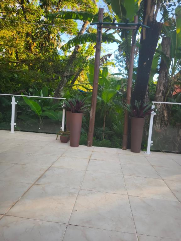 Een tuin van Quarto com cama de casal - Florianópolis