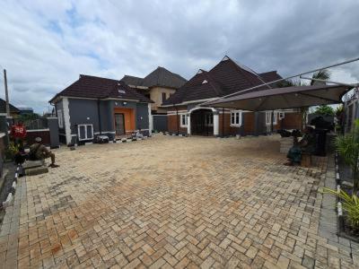 a large brick yard in front of a house at Rehoboth in Mama