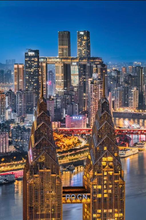 a view of a city skyline with tall buildings at Merica Hotel-ChongQing jiefangbei in Chongqing