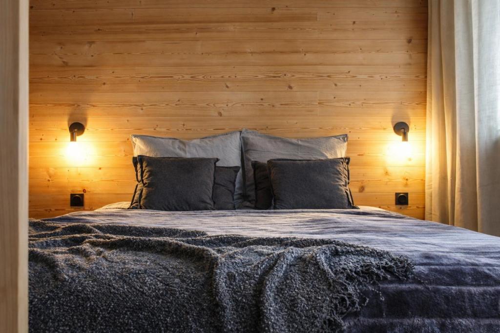 En eller flere senge i et værelse på Le lodge étoilé - Station de ski Font-Romeu Pyrénées 2000