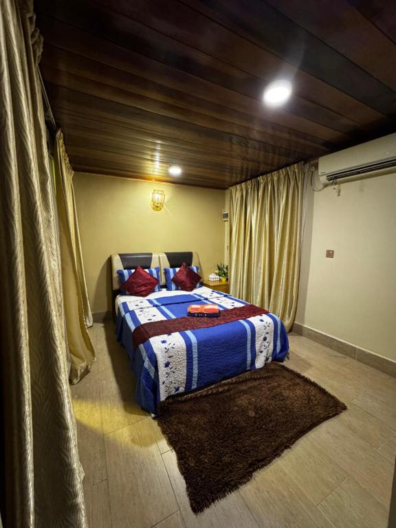 En eller flere senge i et værelse på Norvilla Rooftop Pantai Cenang