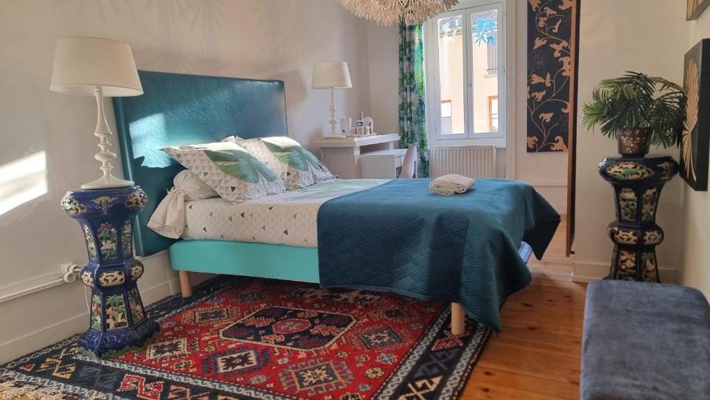 En eller flere senge i et værelse på Clos Germanois