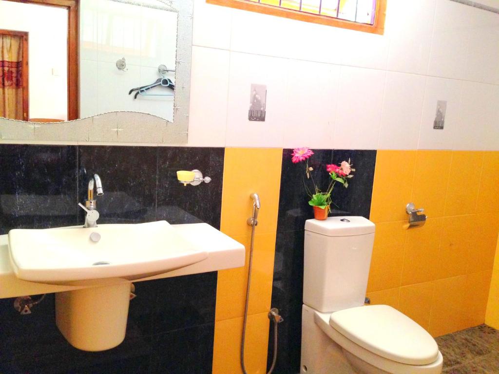 Koupelna v ubytování Eeshani Guest Inn