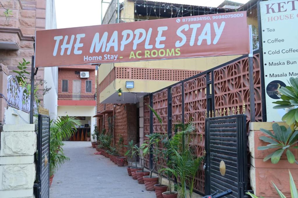 a sign that reads the maple stay at a house at The Mapple Stay in Jodhpur