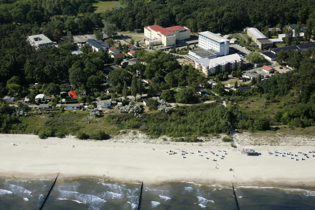 an aerial view of a beach with a group of people at Hotel Wikinger in Zempin