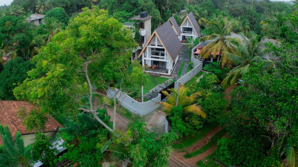 an aerial view of a house in the forest at Gone4Coastal - Cabana in Hikkaduwa