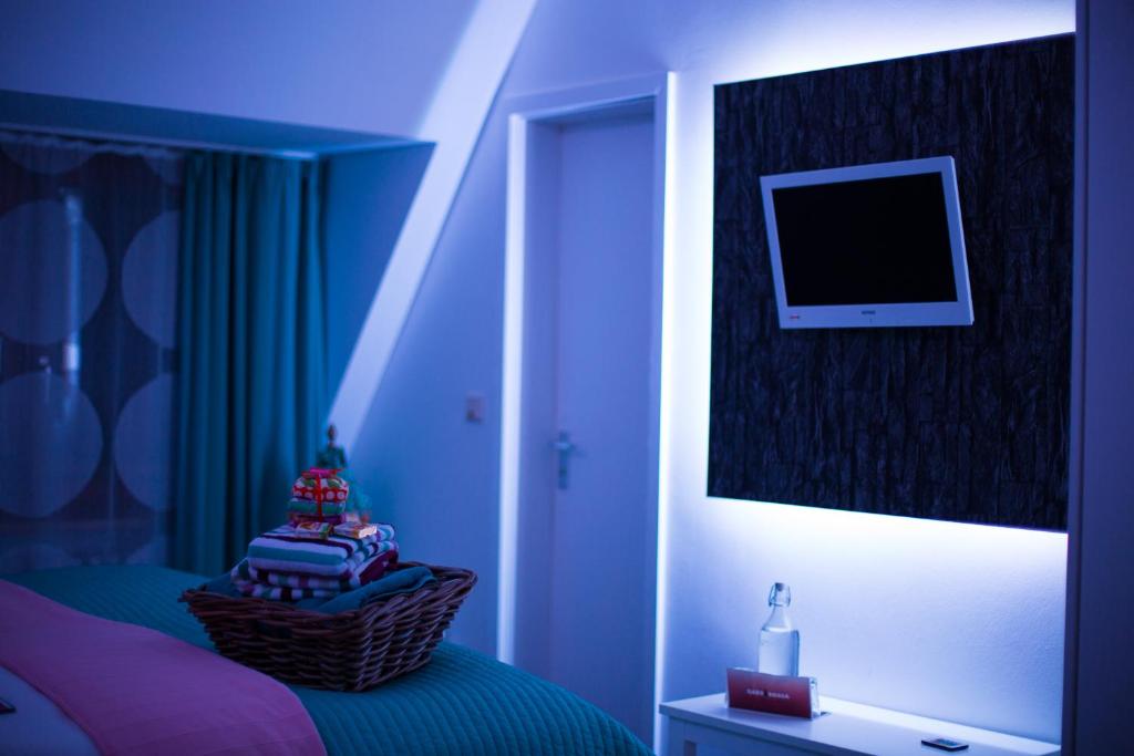 Postel nebo postele na pokoji v ubytování Hotel Barbarossa Garni