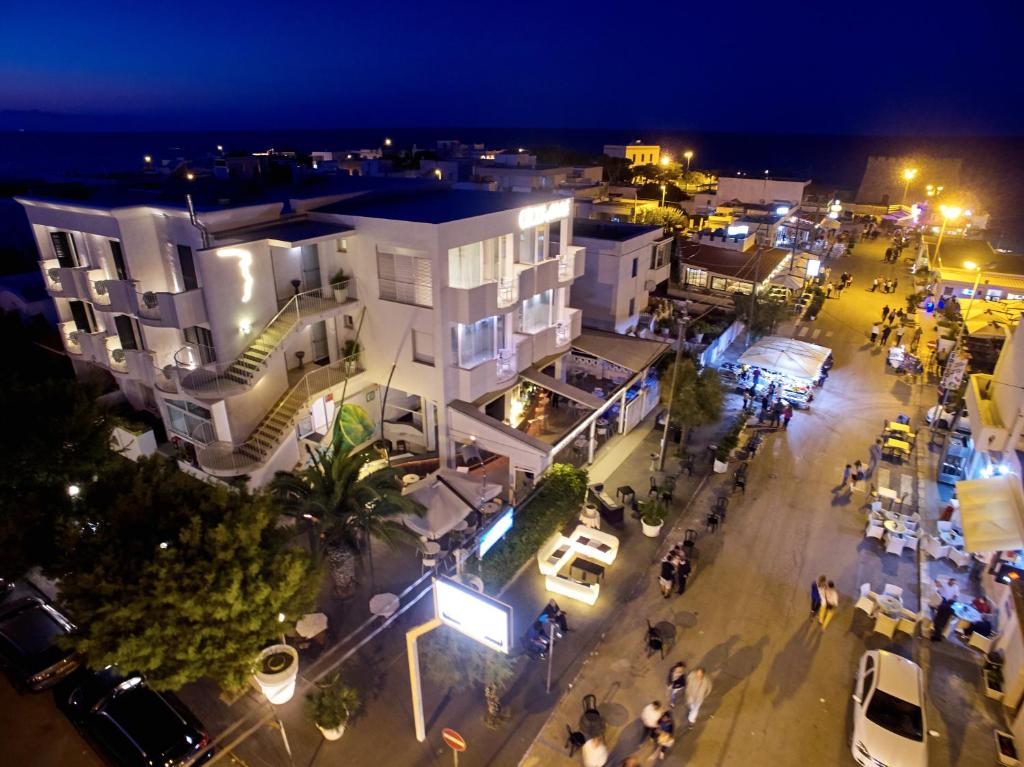 an overhead view of a city at night at Hotel Cicò in Torre Santa Sabina