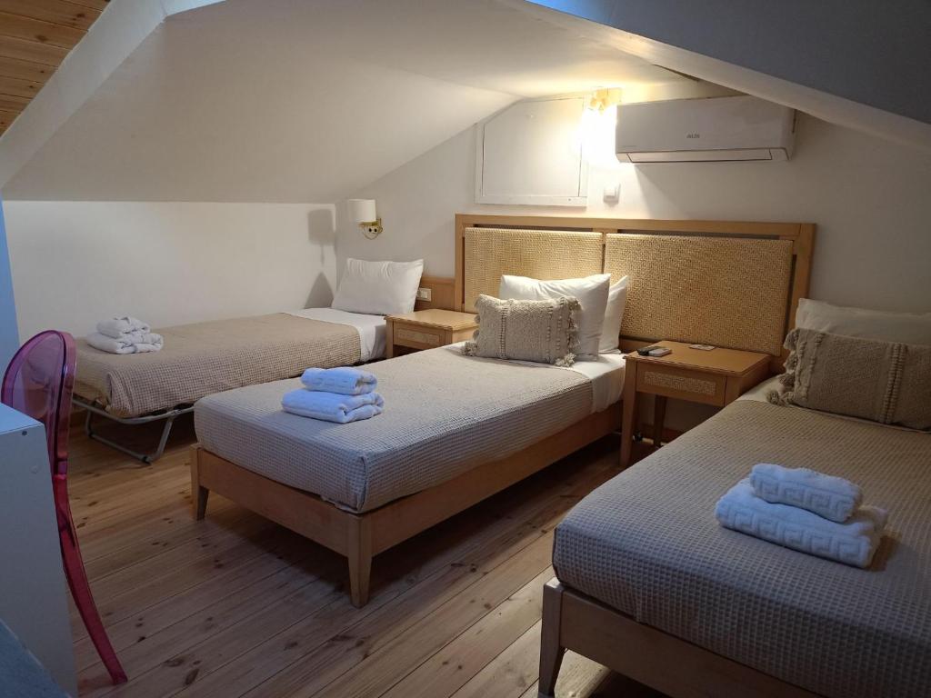 En eller flere senge i et værelse på SITIA CITY CENTER luxury apartment