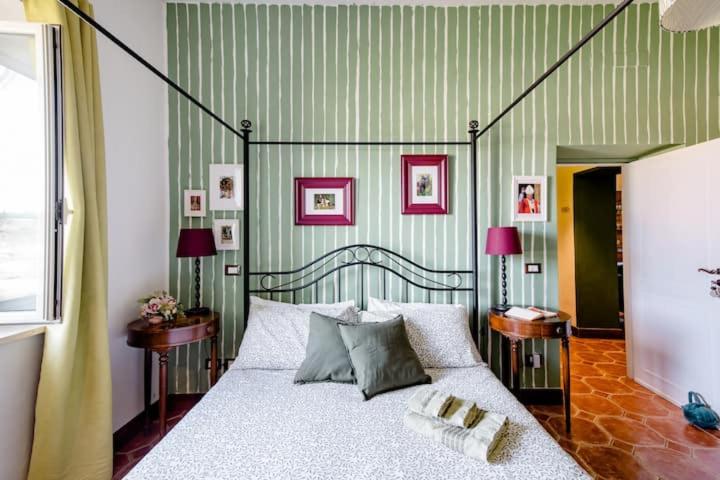 Giường trong phòng chung tại Casa di A-mici, 42km da Roma