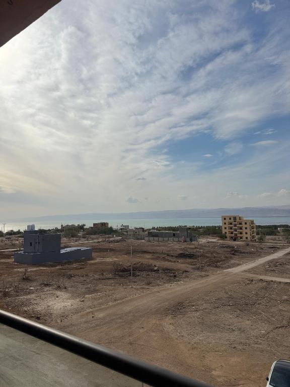 a view of a construction site with the ocean at Seaview horizon apartment in Sowayma