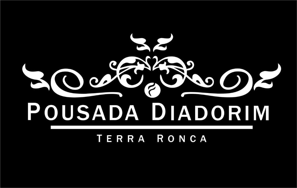 a black and white logo with a tiara at Pousada Diadorim Terra Ronca in Sao Domingos de Goias