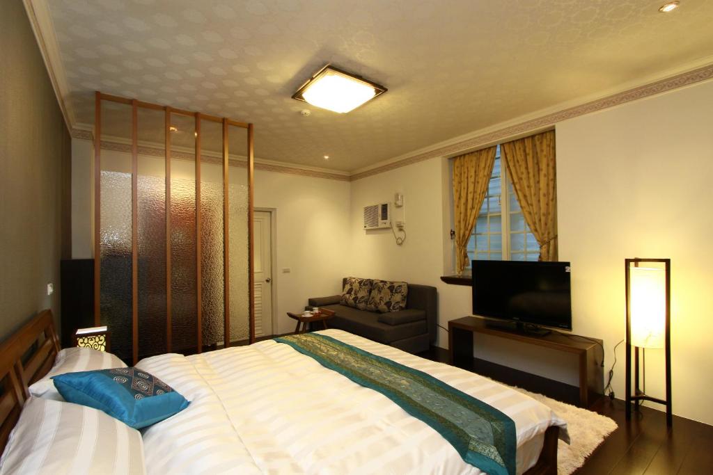Postel nebo postele na pokoji v ubytování Star Shine B&B