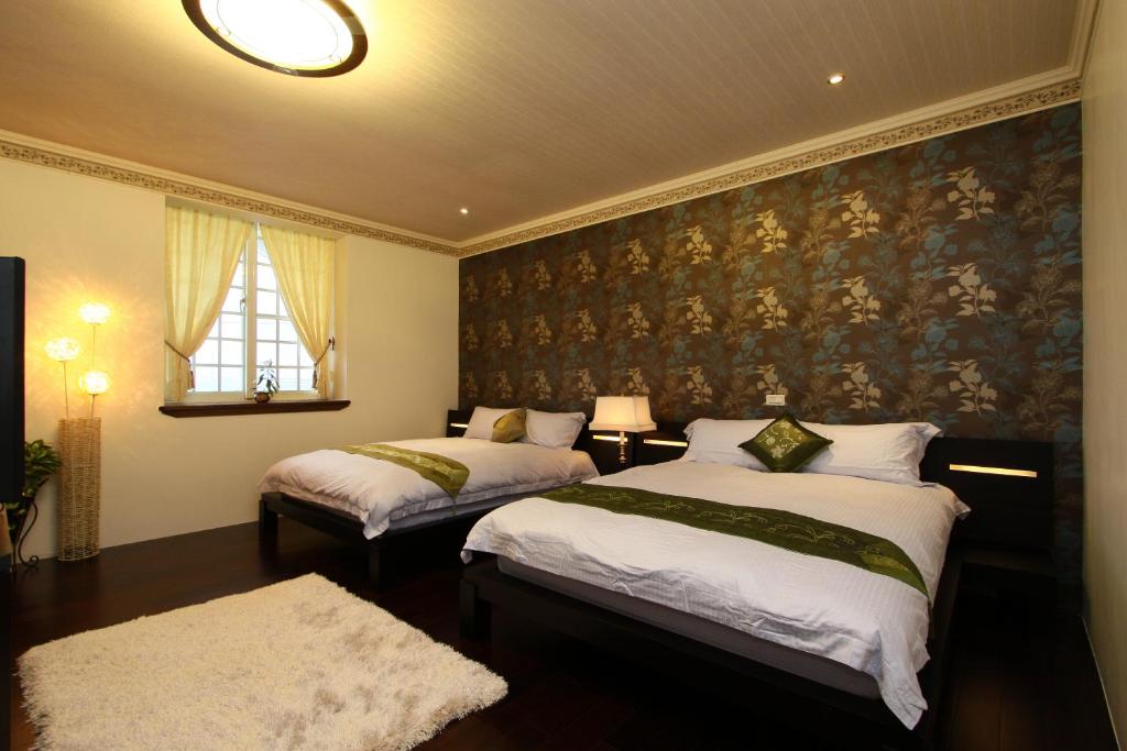 Postel nebo postele na pokoji v ubytování Star Shine B&B