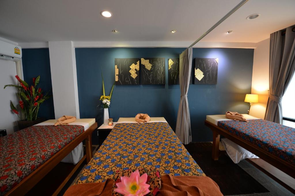 Postel nebo postele na pokoji v ubytování Blue Tara Hotel Krabi Ao Nang