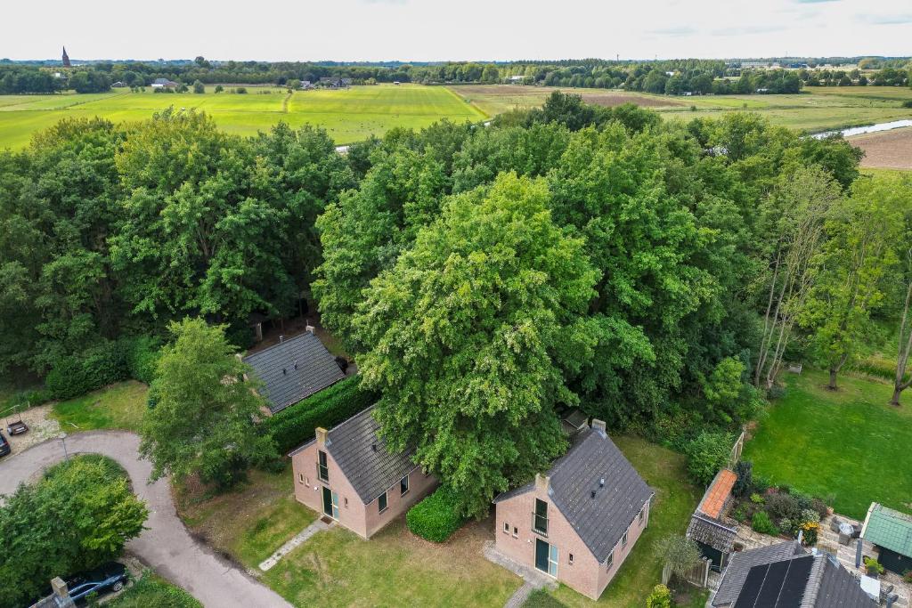 an overhead view of a house and trees at 6 - Person Forest 183 Bungalow in Ewijk