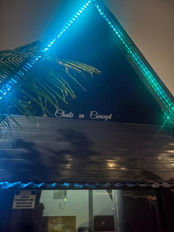 a group of lights on top of a building at In concept chalé completo in Duque de Caxias