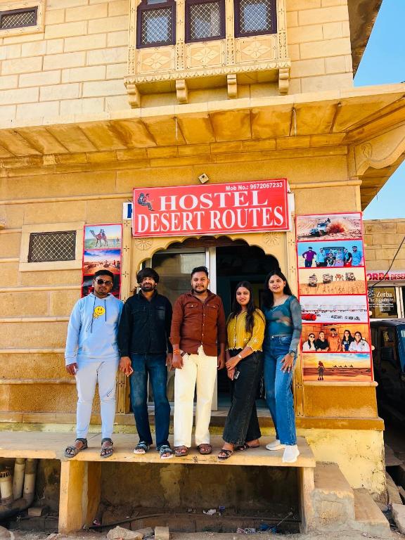 a group of people standing in front of a building at Hostel Desert Routes in Jaisalmer