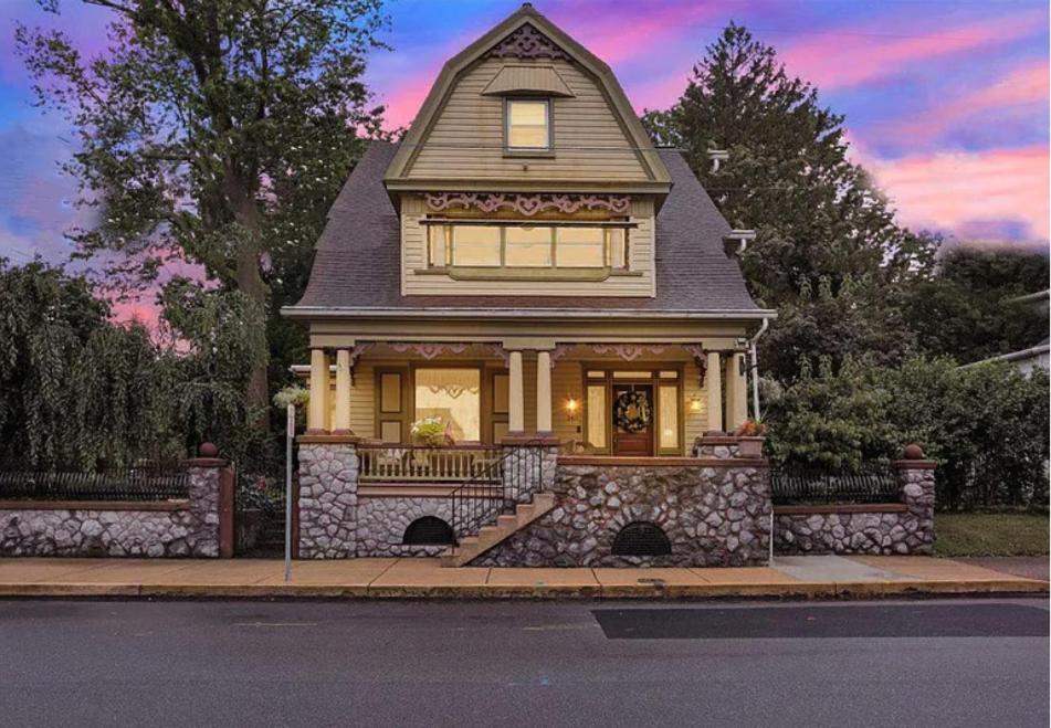 a house on the side of a street at The Manheim Manor in Manheim