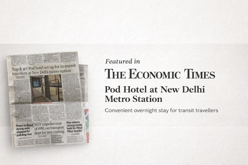 un giornale con il titolo richiesto nell'Economic Times Pod Hotel a New Delhi di Metro POD Hotel at New Delhi Metro & Railway Station a Nuova Delhi