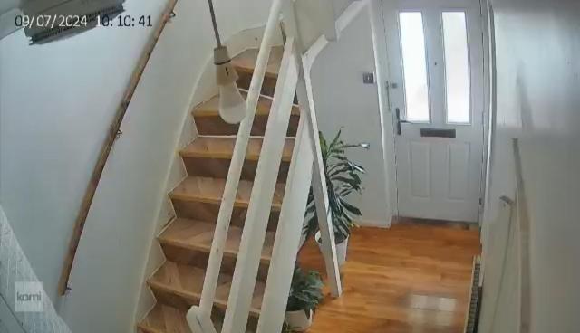 a staircase with white railings in a house at Guesthouse 3 in Tilbury
