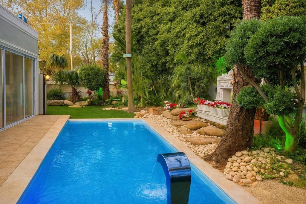 The swimming pool at or close to Private Villa with Heated Pool and Jacuzzi