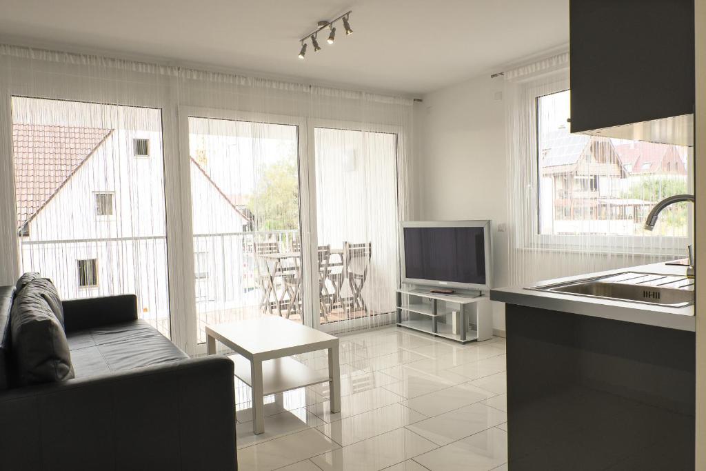 Kuchyň nebo kuchyňský kout v ubytování Design Apartment Metzingen