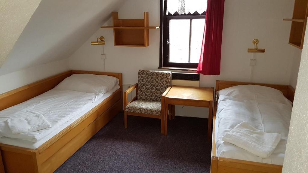 Postel nebo postele na pokoji v ubytování Penzion Přeštěnice