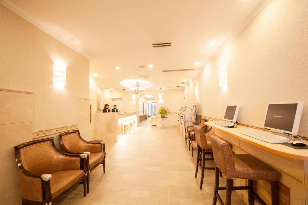TV a/nebo společenská místnost v ubytování Hotel Coco Grand Kitasenju