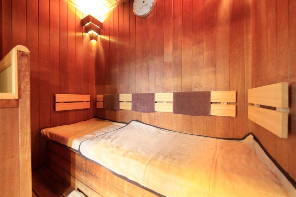 Postel nebo postele na pokoji v ubytování Hotel Coco Grand Kitasenju