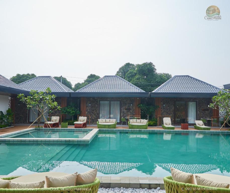 a swimming pool at a villa with a resort at Casa Mithi Private Villas Resort in Mexico