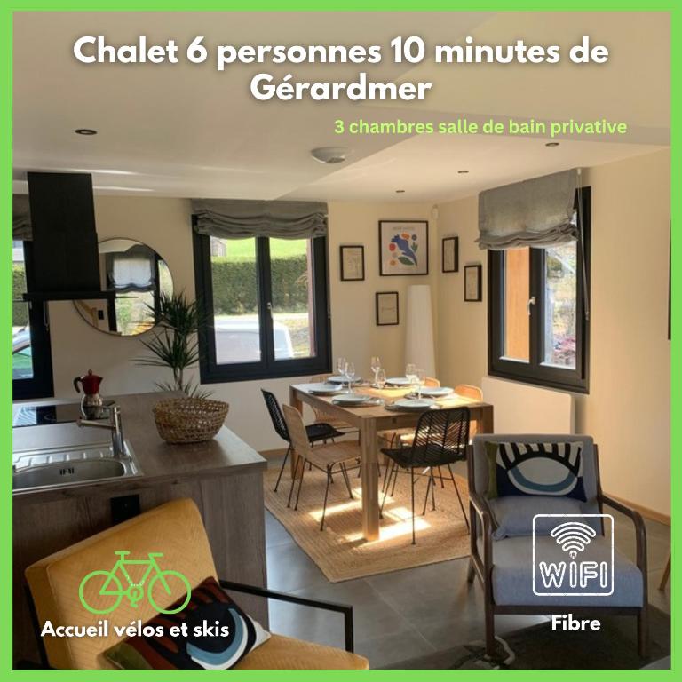 a room with a table and chairs in a kitchen at Loulipo in Gerbépal