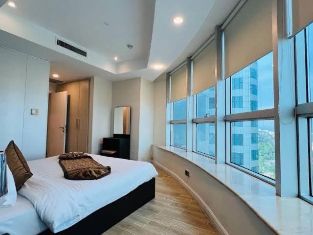 En eller flere senge i et værelse på The Premier Centauras