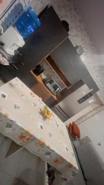 an aerial view of a kitchen with a table at The house in Guarujá