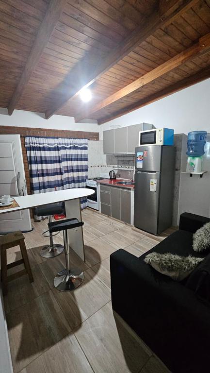 Køkken eller tekøkken på Caleta Olivia Ancla alojamiento departamento